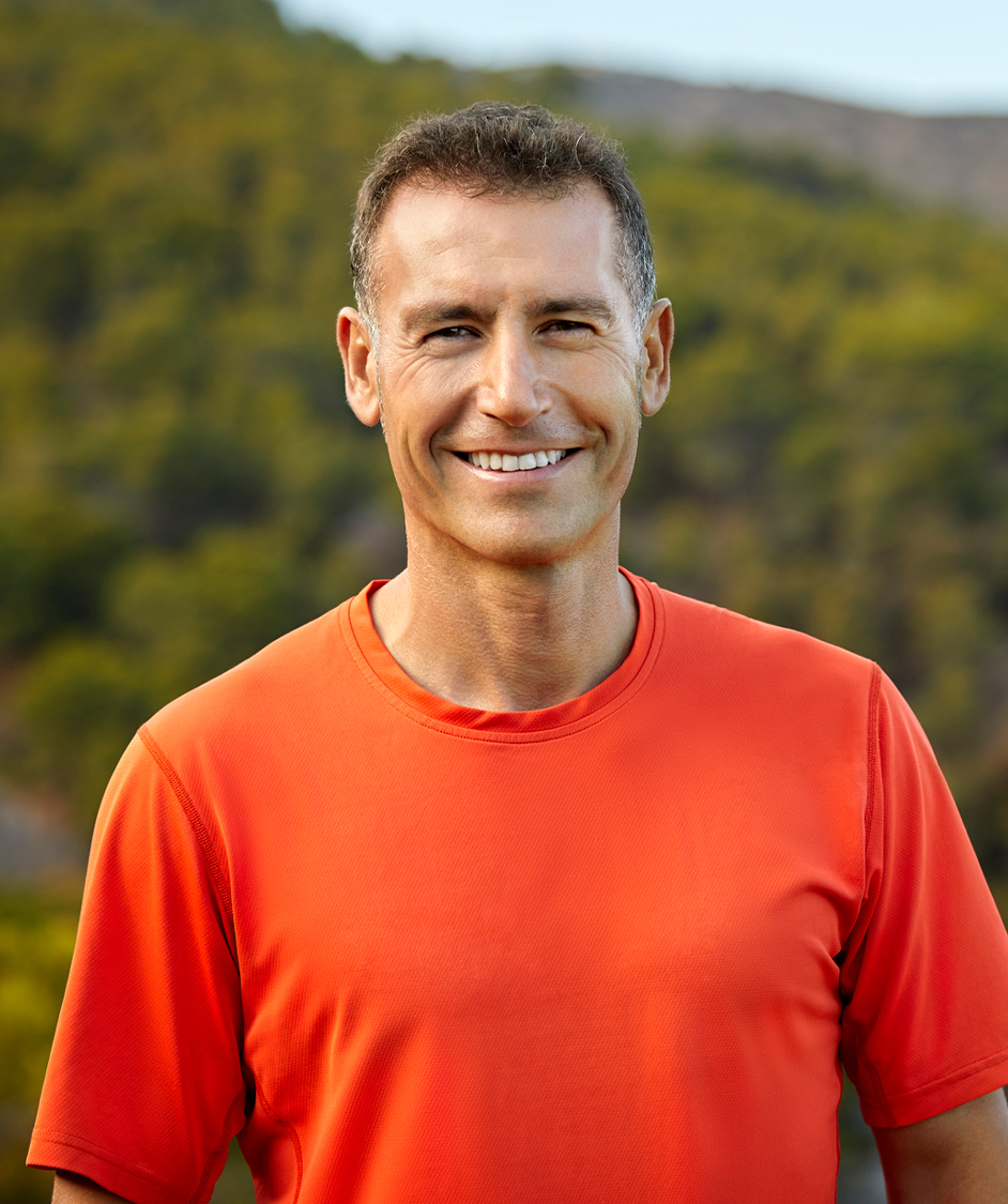 man in an orange shirt